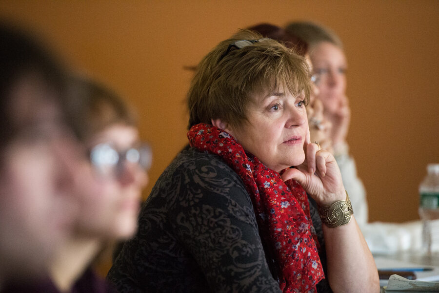 Older female student focused on lecture