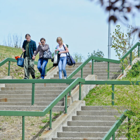 Students walking down the steps to the Quad at CGCC