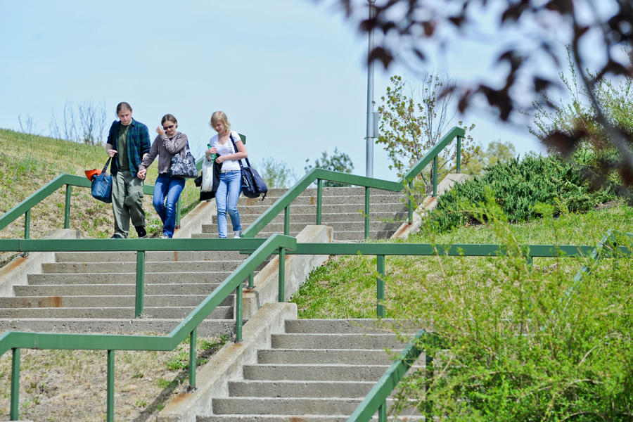 Students walking down the steps of the Quad