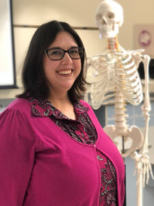 Dr. Melissa Boles with lab skeleton