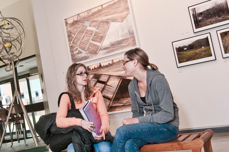 Students sitting in gallery area