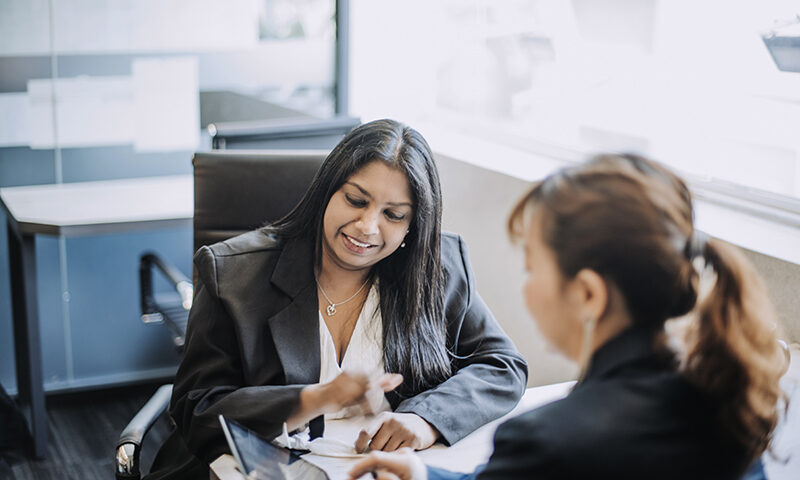 Students working in a professional setting